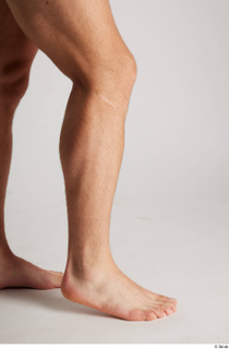 Darren  1 calf flexing nude side view 0002.jpg